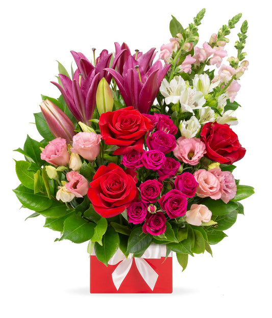 Red, pink and white flowers bouquet delivered in Italy.